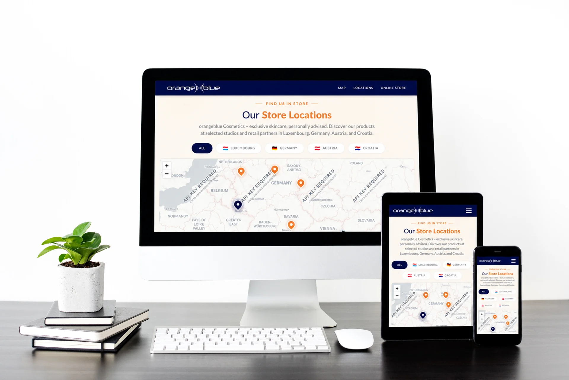 Responsive-Mockup des orangeblue Store-Finders mit Karte und Länderfiltern auf drei Geräten